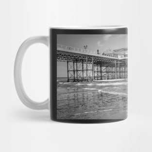 Side on view of the Victorian Cromer pier on the Norfolk coast Mug